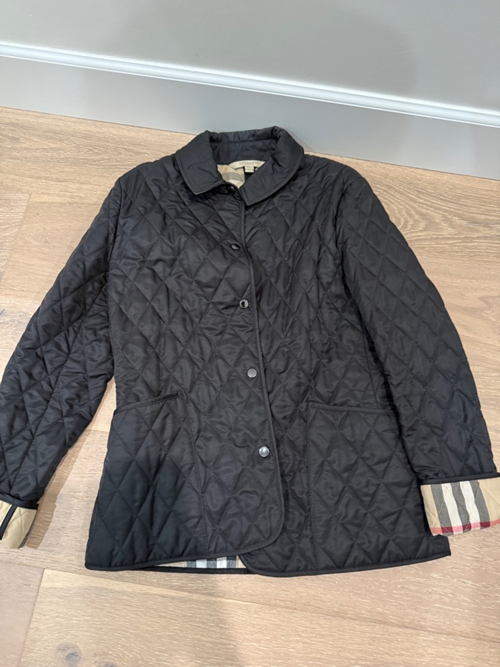 Authentic worn once Black Quilted Women's Jacket with Signature Check Trim